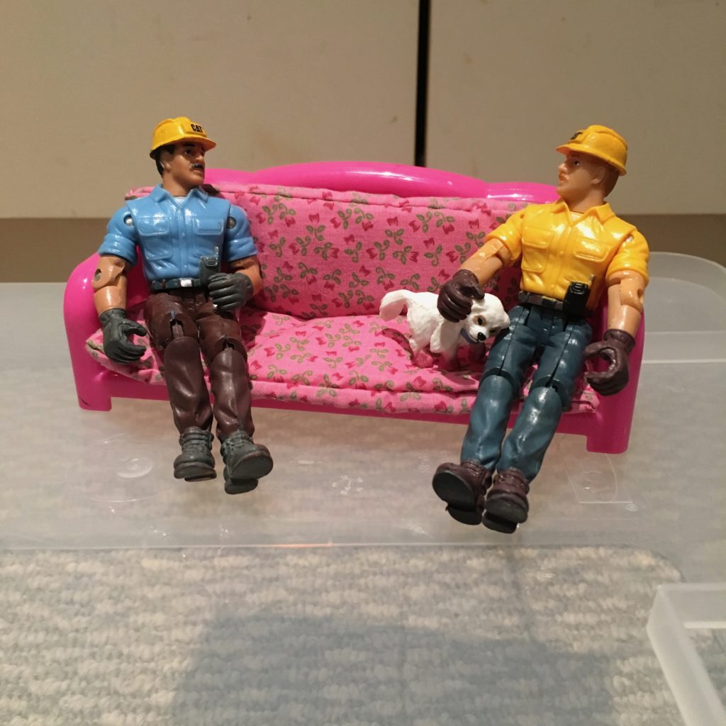 construction-worker-figures-sofa-dog